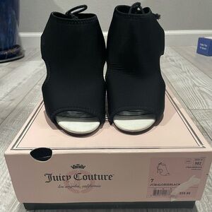 Juicy Couture size 7 black heals with the in back. Super comfortable.